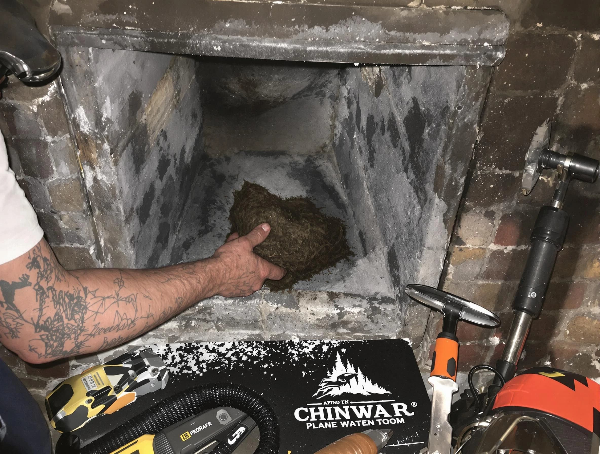 Farr West Chimney Sweep safely removing debris and screening chimney in Farr West, UT